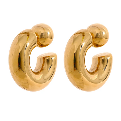 Bold round chunky earrings in C shape on clean background 