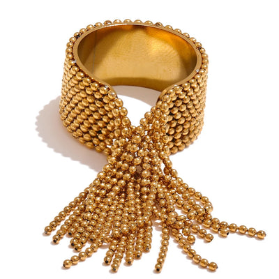 Closeup of gold chain ring on white background