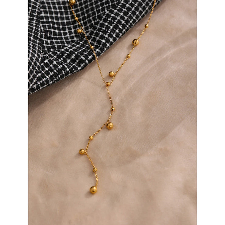 Elegant Gold Bead Pendant Necklace