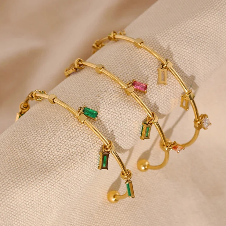 old pendant charm bracelet with multiple charms